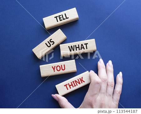 Tell us what you think symbol. Wooden blocks with words Tell us what you think. Beautiful deep blue background. Businessman hand. Business and Tell us what you think concept. Copy space. Tell us what you think symbol. Wooden blocks with words Tell us what you think. Beautiful deep blue background. Businessman hand. Business and Tell us what you think concept. Copy space. 113544187