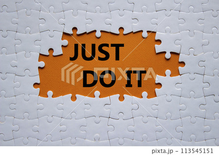 Just do it symbol. Concept words Just do it on white puzzle. Beautiful orange background. Business and Just do it concept. Copy space. Just do it symbol. Concept words Just do it on white puzzle. Beautiful orange background. Business and Just do it concept. Copy space. 113545151
