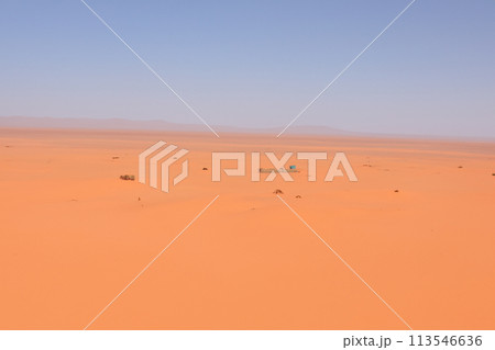 Desert. Dunset in desert. Desert in Dubai. The empty quarter and outdoor sand dune in oman old desert rub al khali. Panoramic. Landscape of golden sand dune with blue sky in Sahara desert. Desert. Dunset in desert. Desert in Dubai. The empty quarter and outdoor sand dune in oman old desert rub al khali. Panoramic. Landscape of golden sand dune with blue sky in Sahara desert. 113546636