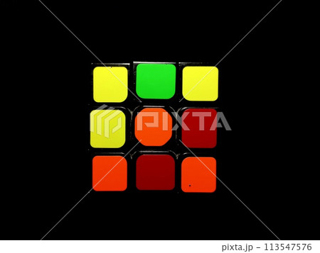 Rubik's cube on a black background. Top view Rubik's cube on a black background. Top view 113547576