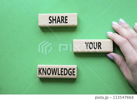 Share your knowledge symbol. Concept word Share your knowledge on wooden blocks. Businessman hand. Beautiful green background. Business and Share your knowledge concept. Copy space Share your knowledge symbol. Concept word Share your knowledge on wooden blocks. Businessman hand. Beautiful green background. Business and Share your knowledge concept. Copy space 113547668
