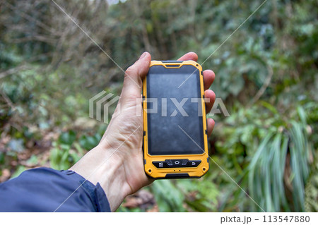 smartphone tracking travel on mountain trails. 113547880