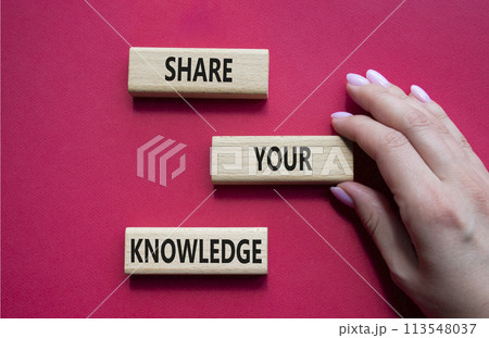 Share your knowledge symbol. Concept word Share your knowledge on wooden blocks. Businessman hand. Beautiful red background. Business and Share your knowledge concept. Copy space Share your knowledge symbol. Concept word Share your knowledge on wooden blocks. Businessman hand. Beautiful red background. Business and Share your knowledge concept. Copy space 113548037