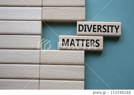 Diversity matters symbol. Wooden blocks with words Diversity matters. Beautiful grey green background. Business and Diversity matters concept. Copy space. Diversity matters symbol. Wooden blocks with words Diversity matters. Beautiful grey green background. Business and Diversity matters concept. Copy space. 113548188
