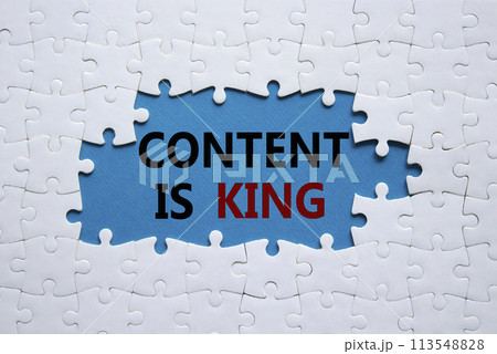 Content is king symbol. Concept words Content is king on white puzzle. Beautiful blue background. Business and Content is king concept. Copy space. 113548828