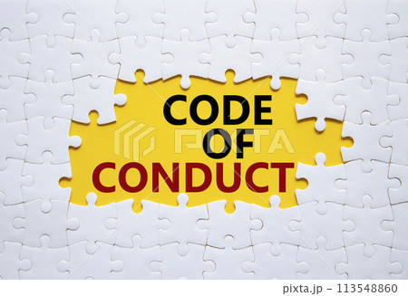 Code of conduct symbol. White Puzzle with words Code of conduct. Beautiful yellow background. Business and Code of conduct concept. Copy space. 113548860