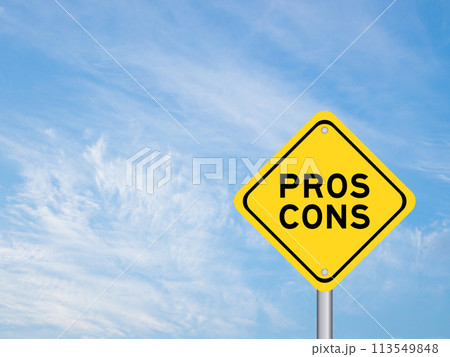 Yellow transportation sign with word pros cons on blue color sky background Yellow transportation sign with word pros cons on blue color sky background 113549848