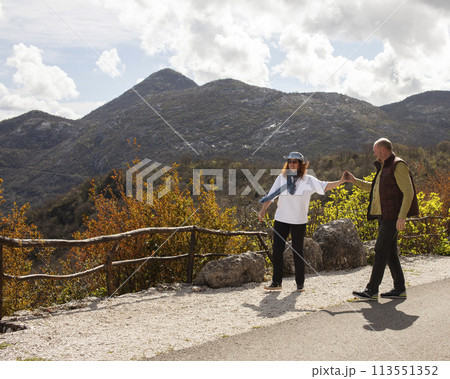 senior friends tourists outdoor adventure together on mediterranian sea close up 113551352