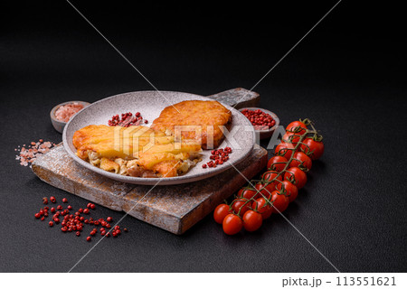Delicious meat fried with Dijon mustard with salt, spices and herbs 113551621