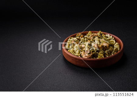 Delicious pasta with spinach, salmon, salt and spices 113551624