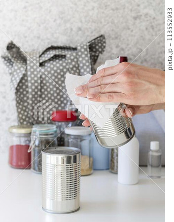 person disinfecting surfaces 113552933