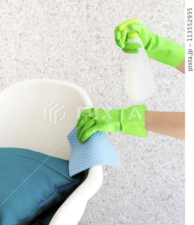 person disinfecting surfaces 113552935