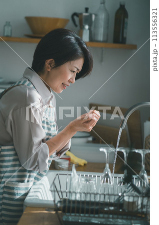 a forty-something woman a forty-something woman 113556321