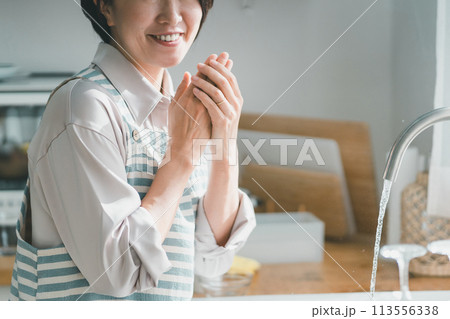 a forty-something woman a forty-something woman 113556338