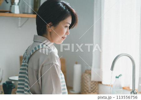 a forty-something woman a forty-something woman 113556756