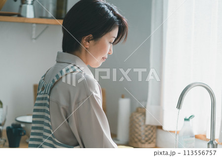 a forty-something woman a forty-something woman 113556757