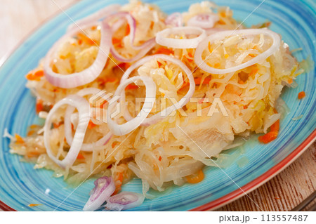 Homemade sauerkraut with onion 113557487