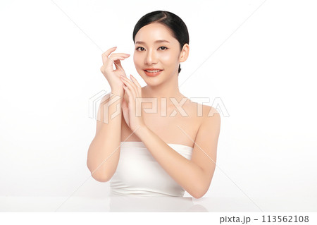 Beautiful young asian woman with clean fresh skin on white background, Face care, Facial treatment, Cosmetology, beauty and spa, Asian women portrait. Beautiful young asian woman with clean fresh skin on white background, Face care, Facial treatment, Cosmetology, beauty and spa, Asian women portrait. 113562108