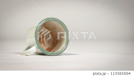 Dirty coffee mug on white background 113565004