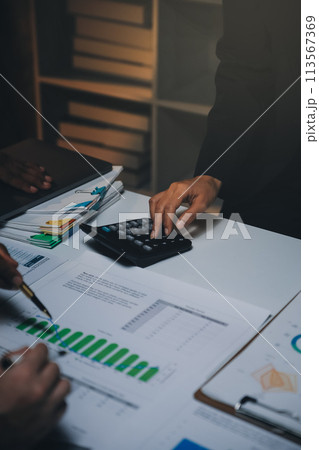 Business team meeting present, investor colleagues consultation and conference new strategy plan business and market growth on financial document graph report, Meeting and Talking. 113567369