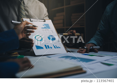 Business team meeting present, investor colleagues consultation and conference new strategy plan business and market growth on financial document graph report, Meeting and Talking. 113567401