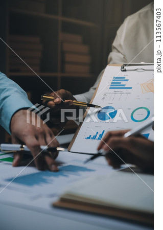 Business team meeting present, investor colleagues consultation and conference new strategy plan business and market growth on financial document graph report, Meeting and Talking. 113567403