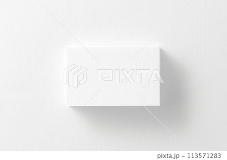 Mockup of horizontal business card stack at white textured background. 113571283