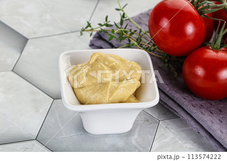 Dijon mustard sauce in the bowl Dijon mustard sauce in the bowl 113574222