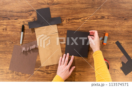 Flat lay. A dedicated teacher brings paper puppets to life, fostering creativity in the classroom through hands-on projects. 113574571