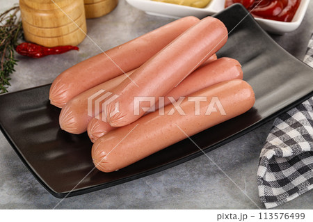 Boiled sausages with ketchup and mustard Boiled sausages with ketchup and mustard 113576499