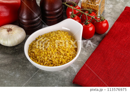 Dry wheat bulgur cereal heap Dry wheat bulgur cereal heap 113576975
