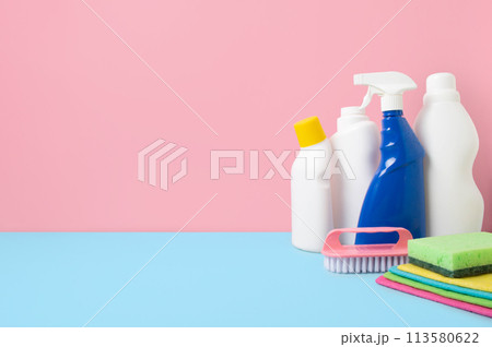 House cleaning product on blue pink bg, copy space House cleaning product on blue pink bg, copy space 113580622