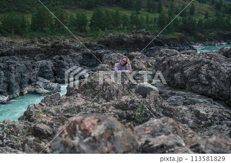Woman at the river Katun 113581829