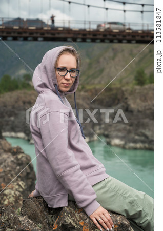 Woman at the river Katun 113581847