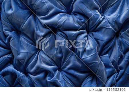 seamless pattern of crumpled expanse of blue fabric 113582102