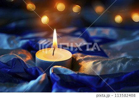 Burning candle on Israel flag background 113582408