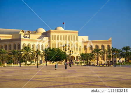 Isa Cultural Centre and plaza in Manama, Bahrain, with palm trees Isa Cultural Centre and plaza in Manama, Bahrain, with palm trees 113583218