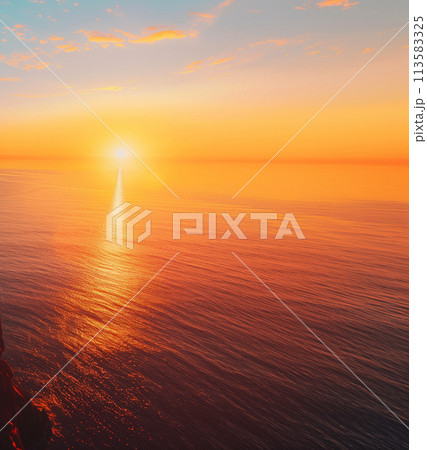 Calm sea under a vibrant sunset, with sun reflecting on water creating a tranquil scene.. Calm sea under a vibrant sunset, with sun reflecting on water creating a tranquil scene.. 113583325