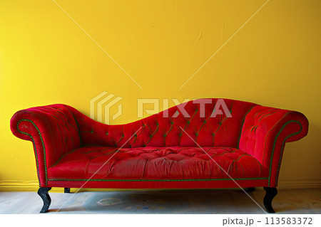 red sofa on yellow background 113583372