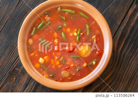 Portion of Minestrone soup 113586264