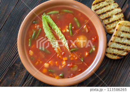 Portion of Minestrone soup 113586265