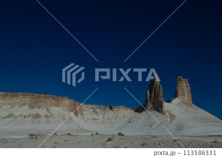 Night scene with the rock pinnacles of Bozzhira valley, Kazakhstan 113586331