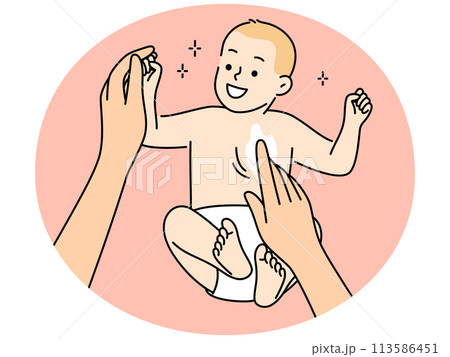 Mother apply cream on newborn baby 113586451