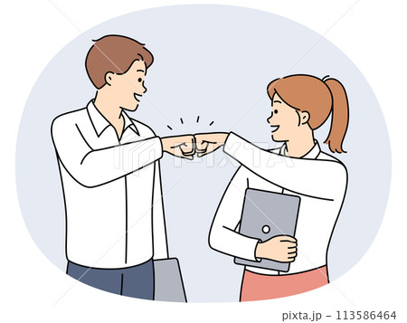 Smiling businesspeople give fists bump Smiling businesspeople give fists bump 113586464