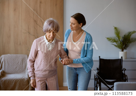 Young daughter caring for retired mom with physical or mental disorder Young daughter caring for retired mom with physical or mental disorder 113588173