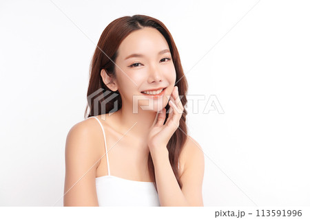 Beautiful young asian woman with clean fresh skin on white background, Face care, Facial treatment, Cosmetology, beauty and spa, Asian women portrait. Beautiful young asian woman with clean fresh skin on white background, Face care, Facial treatment, Cosmetology, beauty and spa, Asian women portrait. 113591996