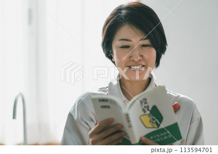 a forty-something woman a forty-something woman 113594701