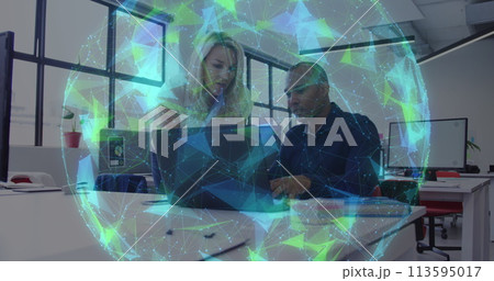 Image of globe with data processing over diverse business people working in office 113595017