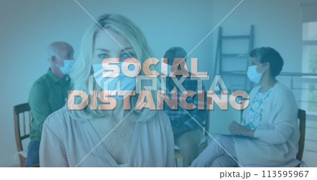 Image of social distancing text over senior people wearing face masks 113595967