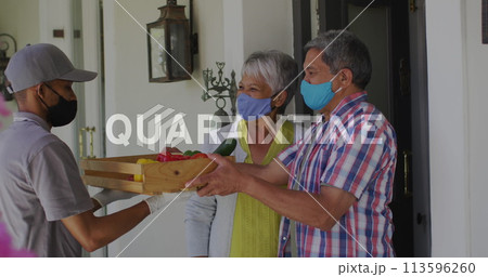 Image of covid 19 cases text man delivering food to senior couple wearing face masks Image of covid 19 cases text man delivering food to senior couple wearing face masks 113596260